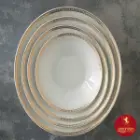 نمای بالای سرویس 30 پارچه چینی زرین وینچی طرح ریوا طلایی